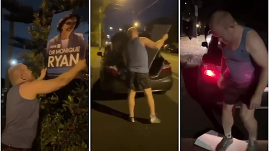 The surgeon was seen ripping down and then stomping on the poster.