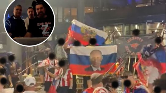 Fans wave banned Russian flags at Melbourne Park. Inset: Srdjan Djokovic.