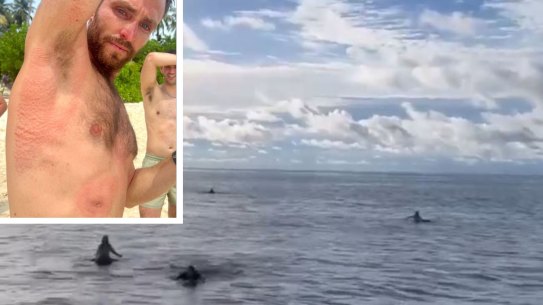 Inset: Elliot Foote after he was rescued. The moment three Australians and one Indonesian crew member were rescued. 