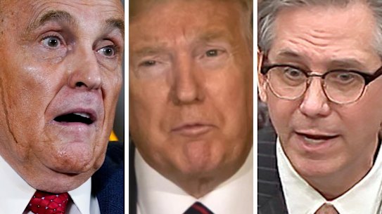 Rudy Giuliani, left, and Bruce Castor, past and present lawyers for former US president Donald Trump, centre.