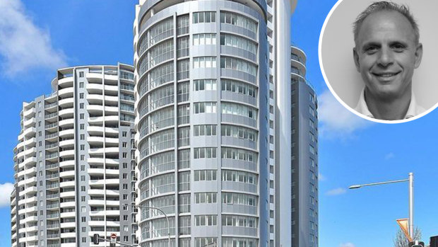 Certifier accused of letting people live in tower while 'still a building site'