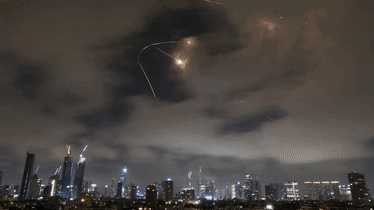 Israeli air strikes in Iran, damaged buildings amid the escalating conflict between Israel and Iran.