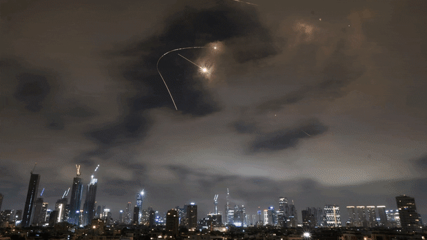 Israeli air strikes in Iran, damaged buildings amid the escalating conflict between Israel and Iran.