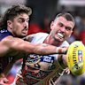 Luke Jackson (left) contests for the ball with Kieren Briggs at ENGIE Stadium. 