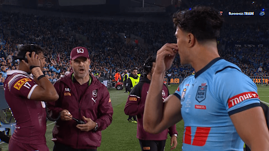 Queensland assistant coach Nate Myles sledges Joseph Suaalii after he was sent off.
