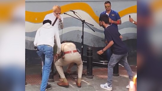 A policeman in Bangalore pulls the plug on Ed Sheeran.