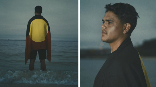 Latrell Mitchell is draped in the Aboriginal flag in the ad.