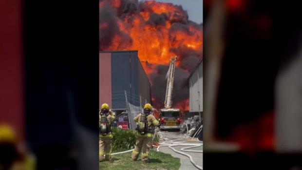 Worker missing after fire engulfs Melbourne paint factory