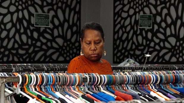 Retail assistant Dorothy Togara says the quality of secondhand clothing imported from Australia has declined over the past few decades.