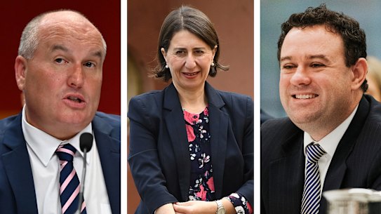 Premier Gladys Berejiklian has leapt to the defence of two of her ministers, David Elliott and Stuart Ayres, as she came under fire about upholding ministerial standards during a budget estimates committee hearing.