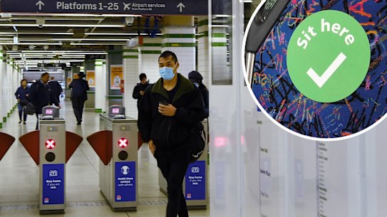 Commuters walk out of Sydney's Central Station on Monday morning and, inset, a sticker on a bus seat to encourage social distancing. Photo: KATE GERAGHTY/Transport for NSW