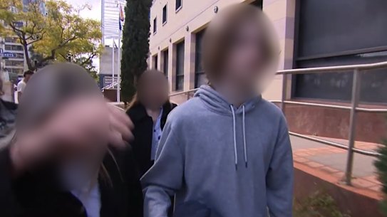 The teenager leaving Perth Children’s Court with his family on Wednesday.