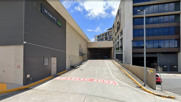 A man’s body was found in the loading dock at Woolworths in Nundah.