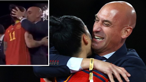 Spanish soccer boss Luis Rubiales kissing and embracing Jenni Hermoso.
