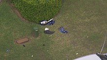 Clothing and other items outside a Glen Alpine home, where a man is believed to have been shot by police.