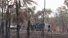 Both cars burst into flames after the crash.
