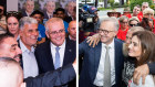 Scott Morrison and Anthony Albanese campaigning on Thursday, two days ahead of the election.