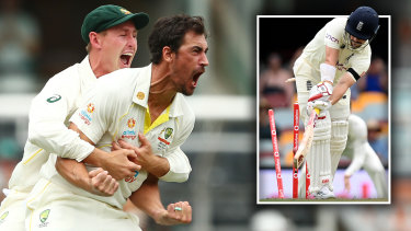 Mitchell Starc celebrates after bowling Rory Burns with the first ball of the match at the Gabba.