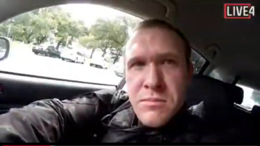 A still taken from a video confirmed by New Zealand Police shows this man in a car with guns before he entered a mosque in Christchurch and began shooting. 
