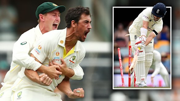Mitchell Starc celebrates after bowling Rory Burns with the first ball of the match at the Gabba.