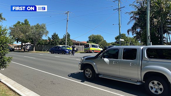 The police cordon on Brookside Road, Labrador, during the siege on Wednesday.