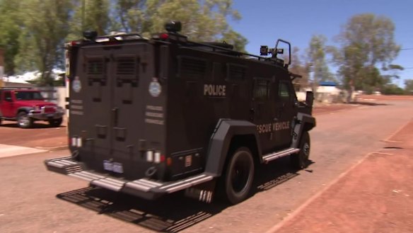 Police, including tactical response group officers, are searching for Kenneth Giles, who is accused of shooting a woman in Mullewa. Picture: 9News Perth 