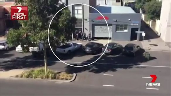 Mark Thompson's Port Melbourne house being raided in January 2018.