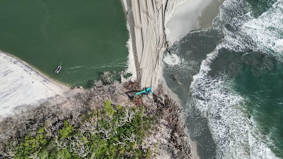 Urgent dredging works to repair a breakthrough on Bribie Island have been completed.