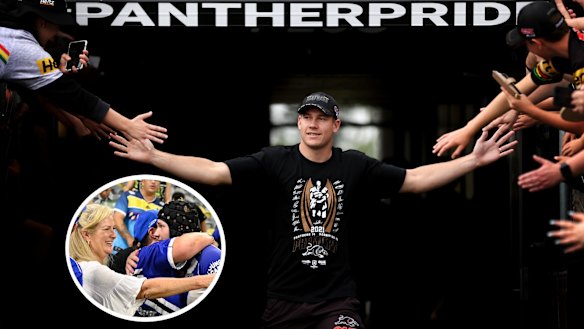 Matt Burton says farewell to Panthers fans and (inset) Burton with Bulldogs fans after his first game for the club.