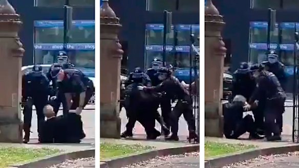 I was grabbed from behind, and marched to a corner. My legs were kicked out from under me and I fell to my hands and knees.