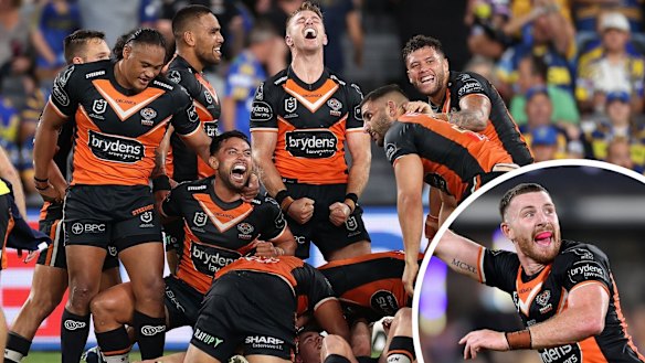 The Tigers celebrate after Jackson Hastings’ last-gasp field goal winner against Parramatta on Easter Monday.