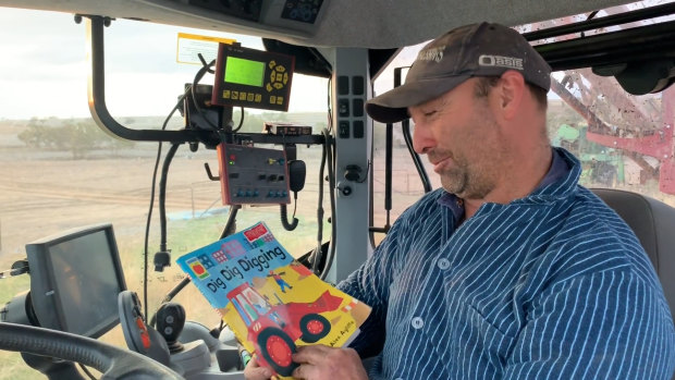 'Farmer Geoffrey' from Warialda reads Dig Dig Digging as he is live streamed from his tractor. 