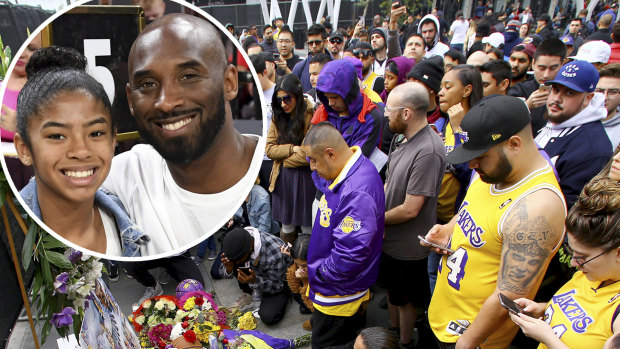 Fans of Kobe Bryant mourn at a memorial to him in front of Staples Center, home of the Los Angeles Lakers. 