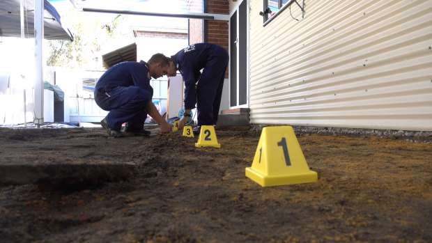 Police at the Carr Street property on Tuesday.