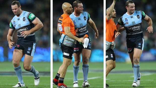 Boyd Cordner before being assisted from the field during Origin I last year.