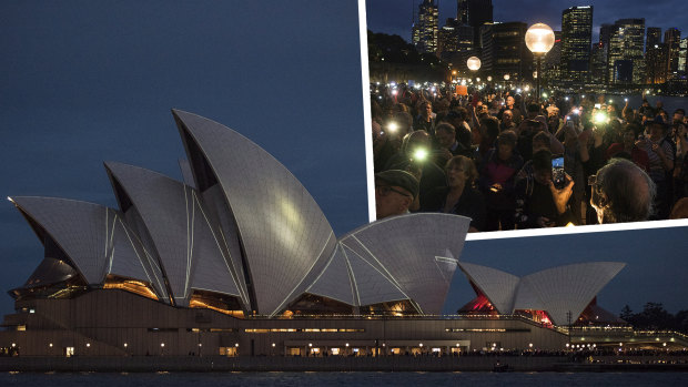 Spotlight: Protesters  opposing the projection of material promoting  The Everest onto the sails of the Opera House.