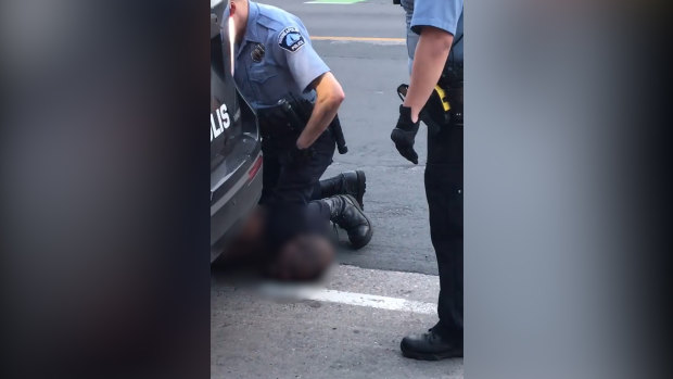 Four Minneapolis police officers were fired a day after a bystander's mobile phone video captured one of them kneeling on the neck of an unarmed black man who later died.