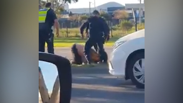 Footage shows a Victoria Police officer allegedly stomping on the man's head.