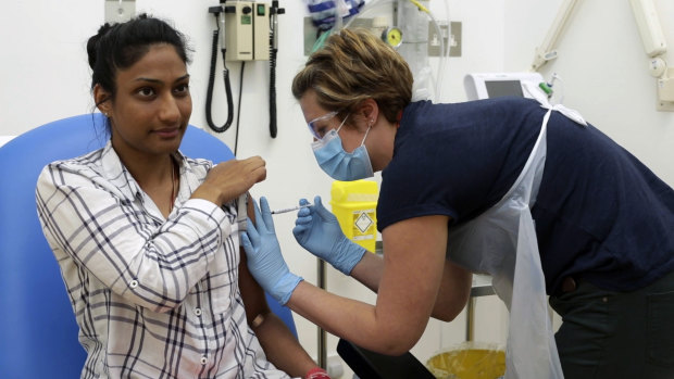 A volunteer is injected as part of a trial of the University of Oxford's COVID-19 vaccine - licenced by AstraZeneca.