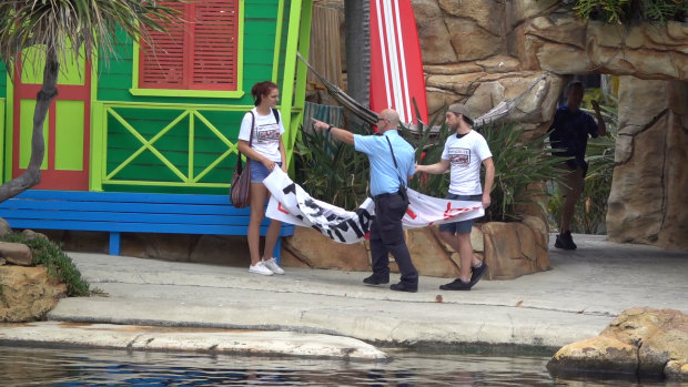 The protesters were escorted from the park.