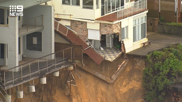 Homes at Wamberal partially collapsed due to sand erosion.