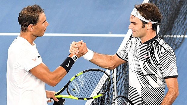 Legends: Nadal congratulates Federer after the epic showdown.