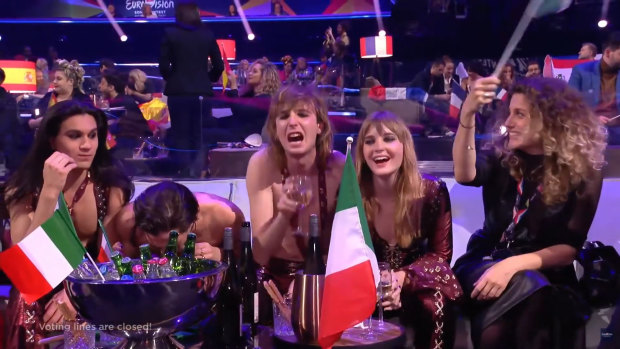 Members of the band Maneskin from Italy wait for the votes during the Eurovision Song Contest grand final. Social media lit up with a video clip in which Maneskin’s front-man Damiano David appeared to sniff something off the table.