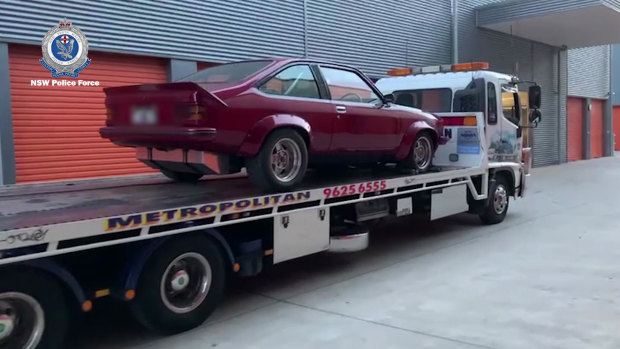 Two classic cars were seized during the raids.