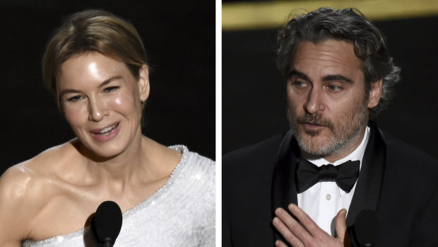 Renee Zellweger and Joaquin Phoenix accept their best actress and best actor Academy Awards.