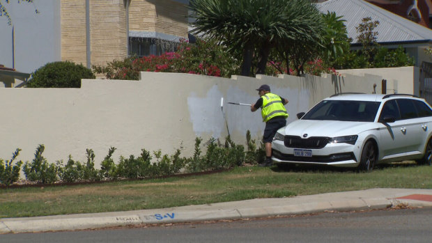 Antisemitic graffiti in the Perth suburb of Dalkeith is covered up on Sunday.