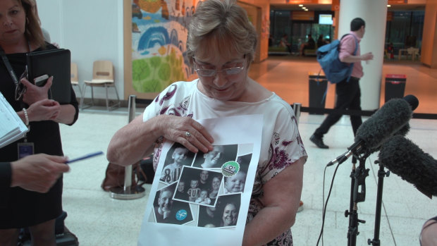 Christine Kilmister shows photos of her son Paul and his family. 