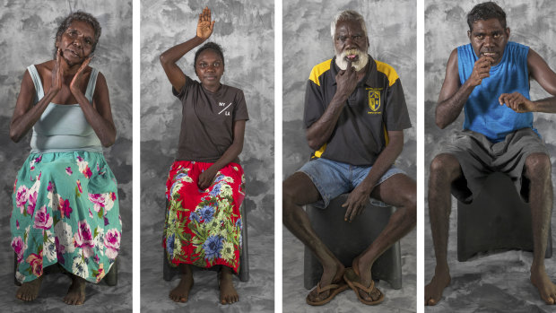 Traditional ways: Daisy Burarrwanga signs djulngi (dear, good, fine, nice); Sheridan Bukulatjpi signs djiwarr (above, sky, heaven);  Fred Djamarrandji signs wanga (speak); and Michael Ganambarr signs marandjalk (stingray). 