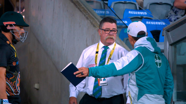 Langer vents his frustration with match referee David Boon at Manuka Oval during a T20 international between Australia and India. 