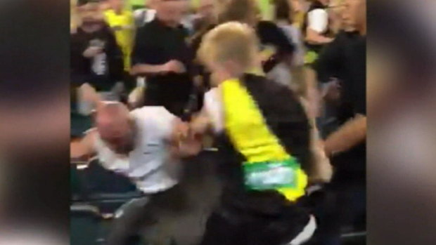 Three men involved in the MCG brawl last Thursday have received a three-year AFL ban.